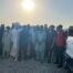Channel's team in Rajanpur, Pakistan with locals for 2022 flood relief work.